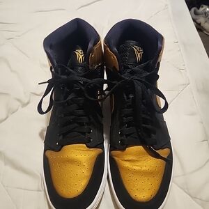 Jordan Black and Gold Sneakers